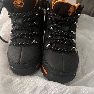 Timberland Kids Boots in Black with Orange Accents
New without tags